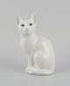 Royal 
Copenhagen. 
Porcelain 
figurine of a 
white Siamese 
cat.
Model number 
8/3281.
Dating: ...