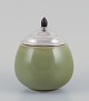 Royal Copenhagen ceramic jar. Silver lid with an ebony knob.
Celadon glaze.