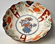 Imari bowl in porcelain, 19th century Japan. Polychrome decorated. Ruffled edge. Unstamped. H.: ...