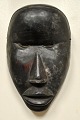 African mask, 
mid 20th 
century. Carved 
hardwood. H.: 
21 cm.
Provenance: 
Globetrotter, 
...