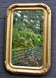 Gilded mirror, 
19th century 
Denmark. With 
border 
decorations. 77 
x 50 cm.
Perfect 
condition!