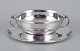 Harald Nielsen 
for Georg 
Jensen. Bowl 
with handles on 
matching 
sterling silver 
saucer.
Georg ...
