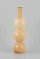 Murano/Venini, 
Italy.
Large 
hand-blown 
ochre yellow 
art glass vase. 
Triple 
gourd-shaped.
Ca. ...