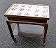 Tile table in polished oak, funkis, 1930s, Denmark. With 15 antique manganese colored Dutch ...