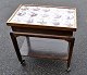 Tile table in 
polished oak, 
funkis, 1930s, 
Denmark. With 
15 antique 
manganese 
colored Dutch 
...