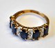 14k gold ring with 5 oval-cut blue sapphires and 4 brilliant-cut diamonds. 20th century. ...