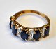 14k gold ring 
with 5 oval-cut 
blue sapphires 
and 4 
brilliant-cut 
diamonds. 20th 
century. ...