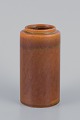 Bengt Berglund 
(1916-1999) for 
Gustavsberg. 
Ceramic vase 
from the 
"Stampe" 
series. Ochre 
yellow ...