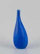 Stig Lindberg 
for 
Gustavsberg, 
Sweden. Ceramic 
vase with a 
slender neck. 
Glazed in blue 
...