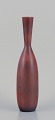 Carl Harry 
Stålhane 
(1920-1990) for 
Rörstrand. 
Large ceramic 
vase with a 
slender neck. 
Glaze in ...