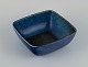 Carl Harry 
Stålhane 
(1920-1990) for 
Rörstrand. 
Large square 
ceramic bowl 
with glaze in 
blue and ...