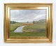 Landscape 
painting with 
gold leaf frame 
painted by the 
artist Ole Ring 
(b.1902-d.
1972), who ...