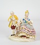 Figure of royal couple with royal attire detailed hand painted work.H: 11.5 W: 10.5