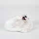 The porcelain figure of a bear with number 729 from Royal Copenhagen (Gl. RC) is a beautiful and ...