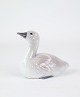 The Royal 
Copenhagen 
porcelain 
figure with the 
number 361, 
called "Swan 
Cub," is a 
beautiful ...