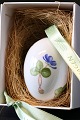 Classic 
porcelain egg 
from Royal 
Copenhagen, 
with motif of 
blue anemone 
from year 2007. 
These ...