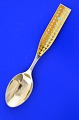 Anton Michelsen 
christmas 
cutlery, gilded 
sterling silver 
with an enamel 
motif. 
Christmas spoon 
...