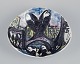 Silvestri, Venice, Italy. Unique ceramic bowl with a cityscape featuring female 
faces. Hand-decorated.