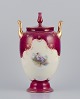 Rosenthal and Wien. Early lidded porcelain vase with two handles.Classic form. Hand-painted at ...