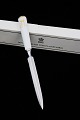 Royal 
Copenhagen 
paper knife 
with "Princess 
Benedikte's 
logo" 
Length: 20cm. 
Same model as 
the ...