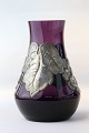 Beautiful and 
rustic glass 
vase with tin 
frame, ideal 
for the living 
room table or 
windowsill. ...