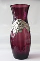 Beautiful antique vase in aubergine-coloured glass, with pewter frame. The vase is 27 ...