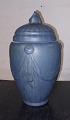 Blue glazed ceramic urn with matching lid. This is fixed with steel wire, which is why the lid ...