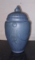 Blue glazed 
ceramic urn 
with matching 
lid. This is 
fixed with 
steel wire, 
which is why 
the lid ...