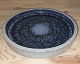 Large round 
bowl in 
ceramics from 
the Palshus 
factory. 
Covered in blue 
glaze. Gray 
border. ...