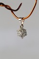 Beautiful 
little 
star-shaped 
pendant in 14 
carat white 
gold that will 
look elegant in 
a thin ...