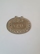 Badge in brass with the text "Bud ved brandcorpset"Dimension 6,5 x 8,5 cm.