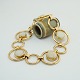 Carl Antonsen; Bracelet in 14k gold. Set with 5 opals.From around 1970.Stamped "CA 585".L. ...