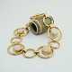Carl Antonsen; 
Bracelet in 14k 
gold. Set with 
5 opals.
From around 
1970.
Stamped "CA 
585".
L. ...