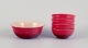 Le Creuset, France. A set of five red stoneware bowls. Hand-glazed.