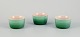 Le Creuset, France. Three green stoneware pie dishes with hand-glazed finish.