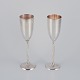 Gunilla Lindahl 
Scandia 
Present, 
Sweden. Two 
large champagne 
flutes in 
plated silver. 
...