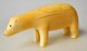 Large Greenlandic carved polar bear, 20th century. Presumably narwhal's tooth. L.: 10.4 cm.NB: ...