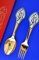 Anton Michelsen 
Christmas 
cutlery, gilded 
sterling silver 
with an inlaid 
enamel motif. 
Christmas ...
