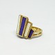 Julia Plana; 
Ring of 18k 
gold, set with 
three white 
corals and 
three Lapis 
Lazuli. Made in 
USA ...