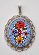 Millefiori 
micro mosaic 
pendant. 20th 
century Italy. 
With metal 
mounting. L: 6 
cm incl. bail.