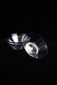 Fine, 1800s 
bowls in clear 
hand-blown 
glass with blue 
rim from 
Holmegaard 
glassworks. H: 
5.5cm. ...