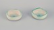 Elchinger, Frankrig. To keramikskåle med glasur i lyse toner. Hånddekoreret. 
Spiralformet dekoration.