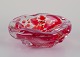 Murano, Italy. Art glass bowl. Clear and red glass with air bubbles inside.