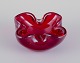 Murano, Italy. 
Art glass bowl 
in deep red 
glass with air 
...