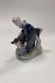 Royal 
Copenhagen 
Figurine Girl 
with Calf No. 
779. Measures 
16 cm x 17 cm 
(6 19/64 in. x 
6 11/16 ...