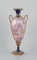 Lucot for 
Sevres, France. 
Large 
amphora-shaped 
urn in faience 
and bronze. 
Sevres Bleu 
decoration ...