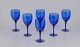 Monica Bratt 
for Reijmyre, 
Swedish 
glassworks. A 
set of six red 
wine glasses in 
blue art glass. 
...
