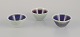 Three Rörstrand 
ceramic bowls 
with glaze in 
violet and 
green shades.
Mid-20th ...