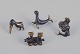 Walter Bosse 
(1904-1979), 
Austria.
Four miniature 
bronze 
figurines. 
Train, mermaid, 
toucan, and ...