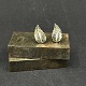 Length 2 cm.
Hallmarked 
John L for John 
Lauritzen, 830S 
for silver, 
Denmark.
A pair of ...